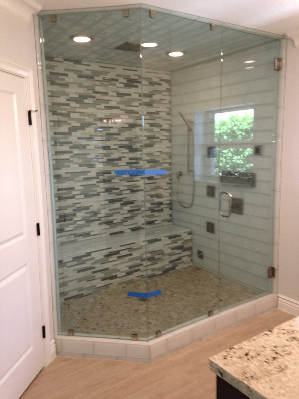 Seamless Shower Doors & Glass | WPB & Jupiter | Actionmirrorandglass.com